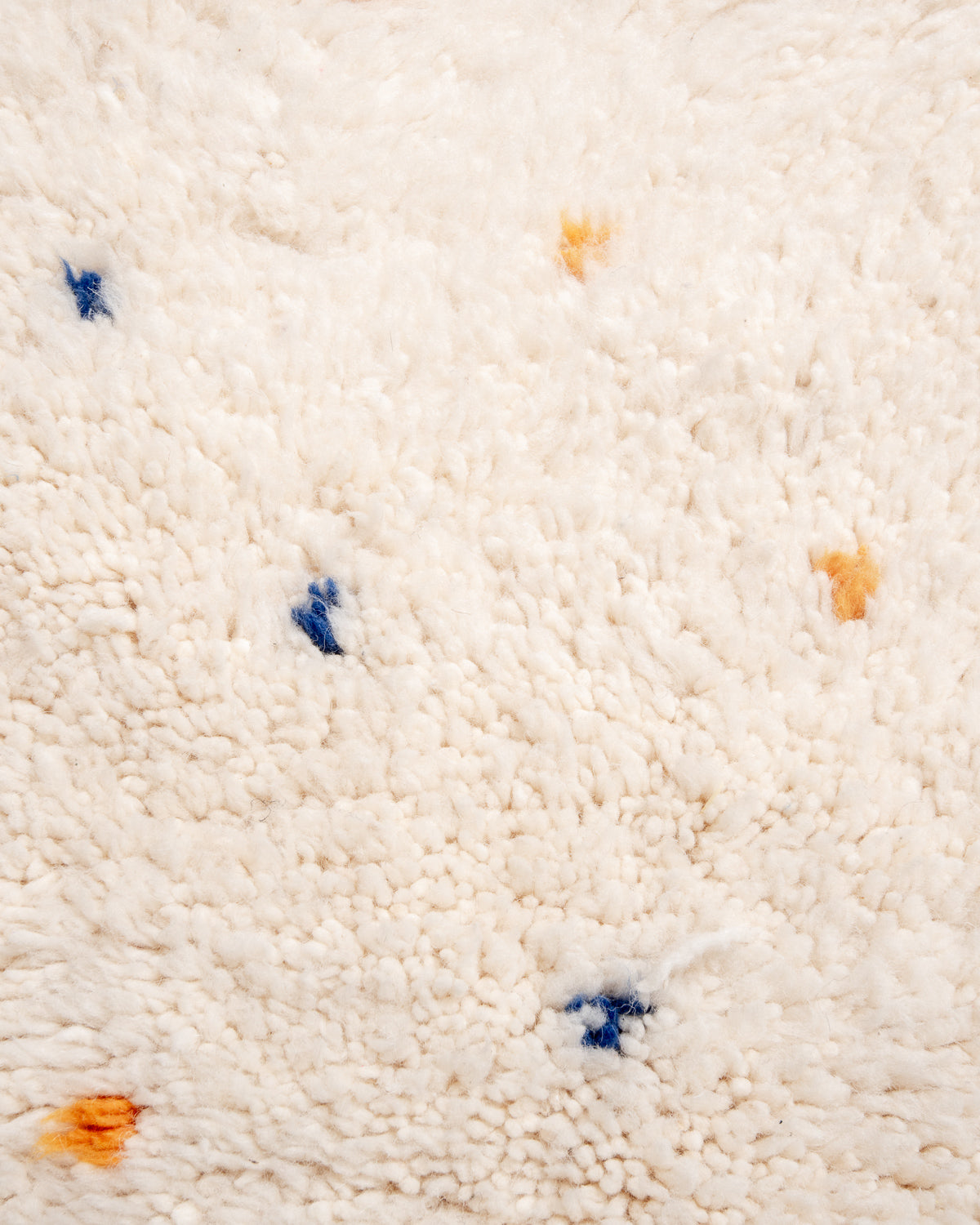 Modern, designer, handcrafted Berber rug from Morocco. Beniourain carpet with beautiful colours and patterns and fluffy wool texture.